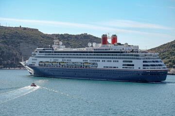 Classic Fred Olsen cruiseship or cruise ship liner Bolette departure sail away from port of...