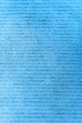 A sheet of blue paper close-up, macro paper fibers, background with horizontal stripes