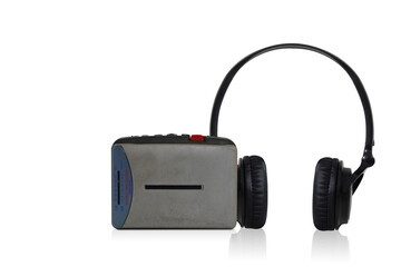 front view grey and blue cassette player and radio and black plastic headphones on white background, technology, object, retro, play, vintage, copy space