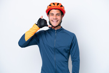 Young cyclist caucasian man isolated on white background making phone gesture. Call me back sign