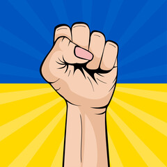 Human fist graphics on Ukraine flag background. Pop-art creative concept. Concept of resistance. Pray for Ukraine. Stop war between Russia and Ukraine. Pray for Ukraine.