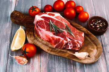 Fresh Raw marbled beef steak on rustic background