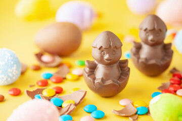 Chocolate chicken, eggs and candy. Easter Food Concept