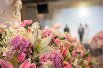Flower bouquet decoration by wedding cake