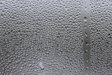 Water frozen on glass. Macro.