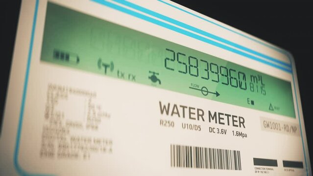 Water meter showing volume of water usage by residential or commercial building. Digital metric water meter measuring water usage