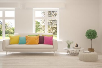 White living room with sofa and summer landscape in window. Scandinavian interior design. 3D illustration