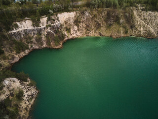 Aerial drone view Basalt columns Amazing industrial landscape, on Emerald lake in a flooded quarry,...