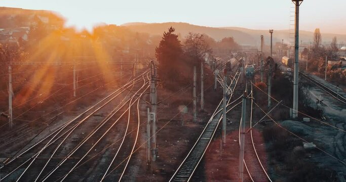 Two old trains passing by in the beautiful sunset