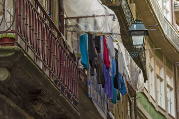 laundry on a balcony in an old street in Porto, Portugal