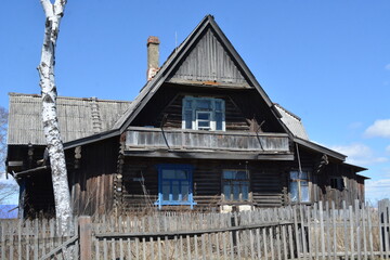 Old wooden two-storey apartment building in the village of Bolon , Khabarovsk Krai