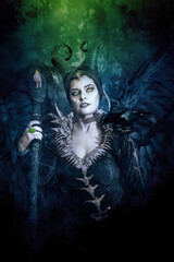 MALEFIC COSPLAY. PORTRAIT, DARK CHARACTER WITH SHARP HORNS AND STRONG WINGS. EVIL FAIRY IN BLACK DRESS. GREEN AND BLUE COLOR.