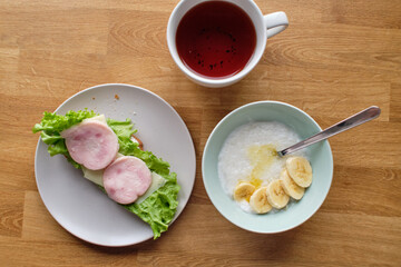Breakfast. Milk rice. Toast with ham and cheese.