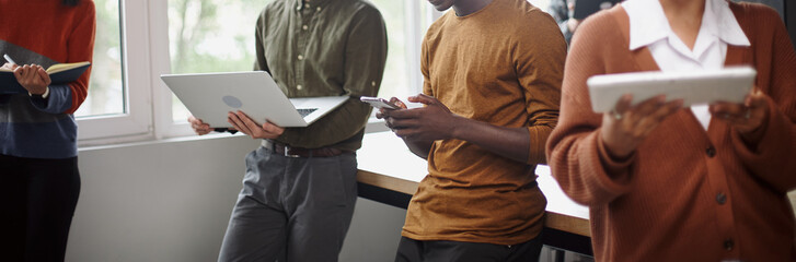 young business woman with a digital tablet standing in the hall