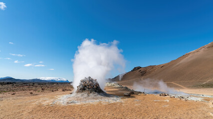 Hverir Myvatn geothermal area with natural steam vents and mud pools all around Lake Myvatn, the...