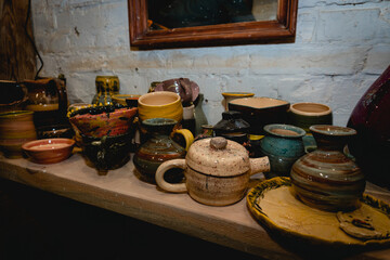 Hand made ceramic tableware, Collection of colorful clay pottery ceramics. Handicraft and art concept.