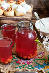 Homemade cherry compote in a jar.