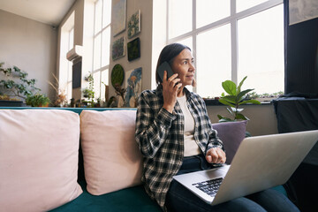 Female working in studio and talking with clients