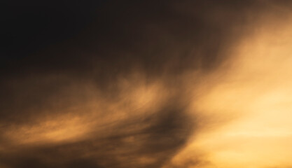 Beautiful bright dramatic sunset in the clouds.