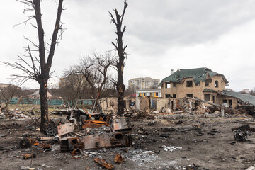 Obraz na płótnie Canvas BUCHA, UKRAINE - Apr. 06, 2022: War in Ukraine. Chaos and devastation on the streets of Bucha as a result of the attack of Russian invaders