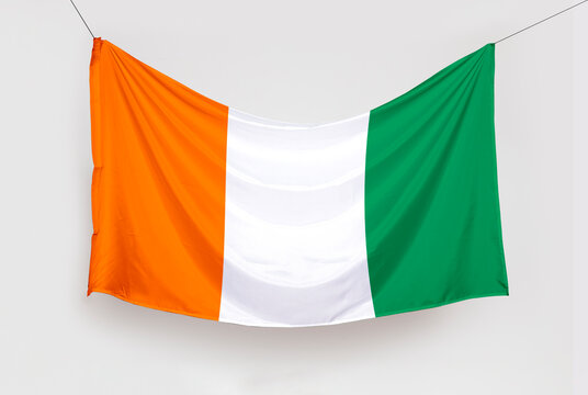 National flag of Côte d'Ivoire isolated on white background. 3d illustration of flag banner