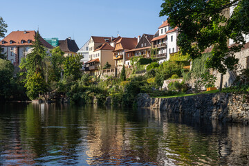 Fototapeta na wymiar Historic houses along Vltava river in Český Krumlov, Czech republic. UNESCO heritage site