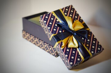 Christmas gift box with a present inside