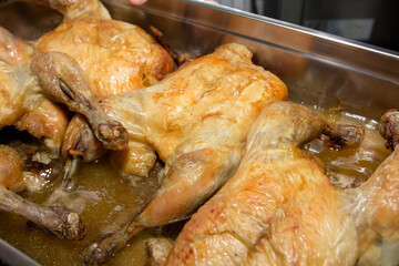 Baked chicken in the restaurant kitchen