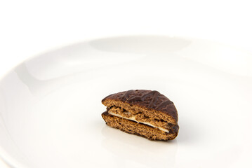Chocolate cookie on white dish