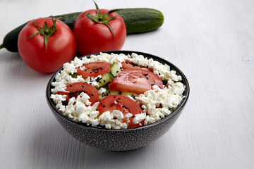 Fresh tomato, cucumber, cottage cheese and black cumin salad