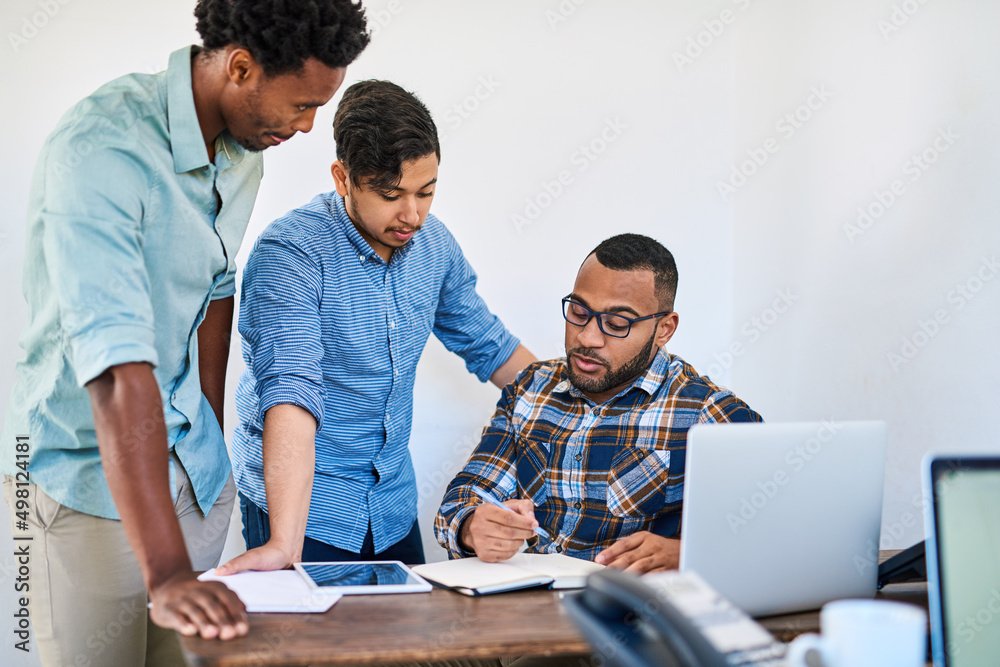 Aufkleber hard work turns a startup into a success. shot of a team of young entrepreneurs having a discussion 
