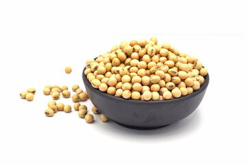 soybean seeds in a wooden bowl isolated on white background