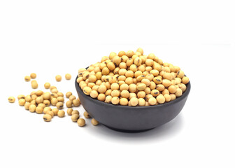 soybean seeds in a wooden bowl isolated on white background