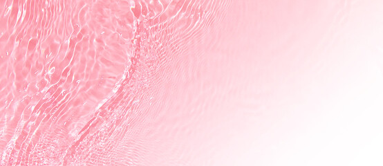Transparent pink clear water surface texture with ripples, splashes. Abstract summer banner...