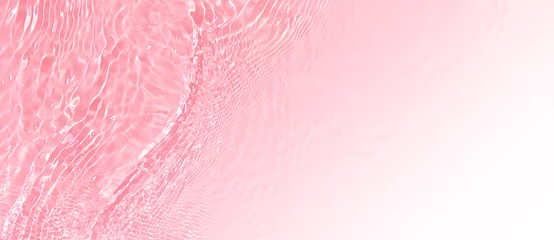 Foto op Aluminium Transparent pink clear water surface texture with ripples, splashes. Abstract summer banner background Water waves with copy space white gradient, top view Cosmetic moisturizer micellar toner emulsion © Aleksandra Konoplya