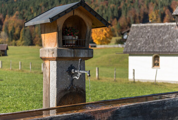 Public drinking water tap in bavarian countryside
