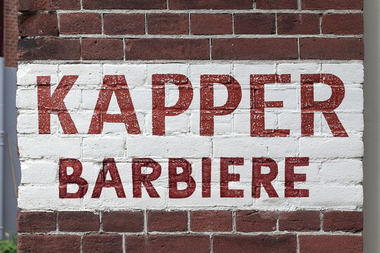Amsterdam Brick Wall with Painted Barbershop Sign, Netherlands