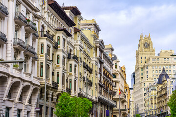 Fototapeta na wymiar Modernist buildings on Madrid's Gran Via, the main street in the centre of the capital.