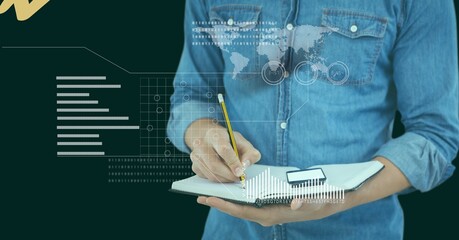 Data processing against mid section of a man writing on clipboard at office