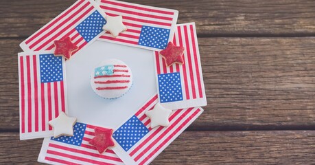Obraz premium Close up view of american flag design cookies on wooden surface with copy space
