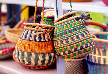 West African Baskets at a Local Outdoor Market - obrazy, fototapety, plakaty