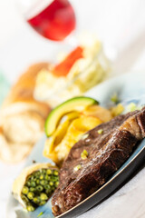 grilled steak with potato gratin