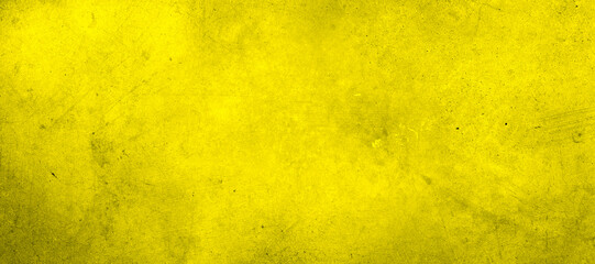 Yellow textured concrete wall wide background