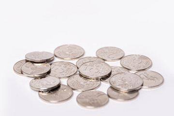 Background of coins of Russian rubles in denominations of 2 rubles, 5 rubles, copy space. The ruble is the national currency of Russia. Money concept.