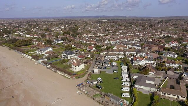 Aerial footage approaching East Preston seafront on the West Sussex coastline with the camp site in view.