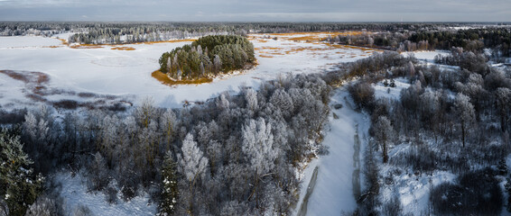 Beautiful winter nature. Scenic landscape. Top drone view of forest.