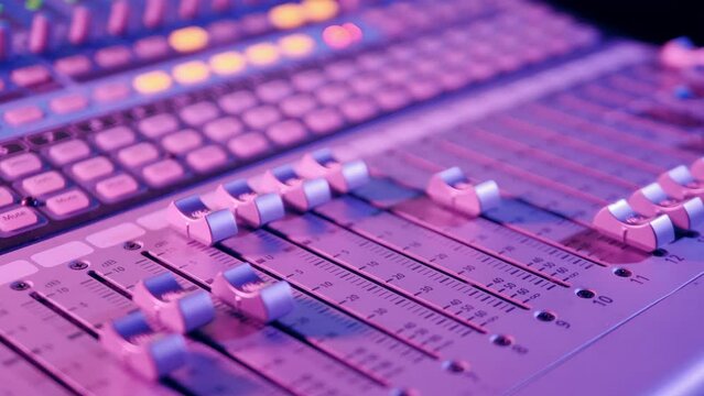 Recording studio with a mixing console being regulated