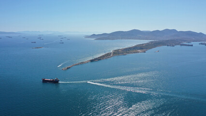 Aerial drone photo of iconic peninsula of Kinosoura or dog's tail in industrial part of island of...