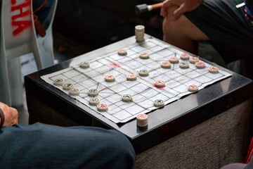 Chinese men playing Elephant chess