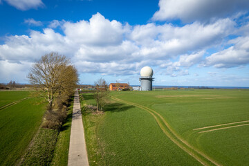 on a hill stands a radar station